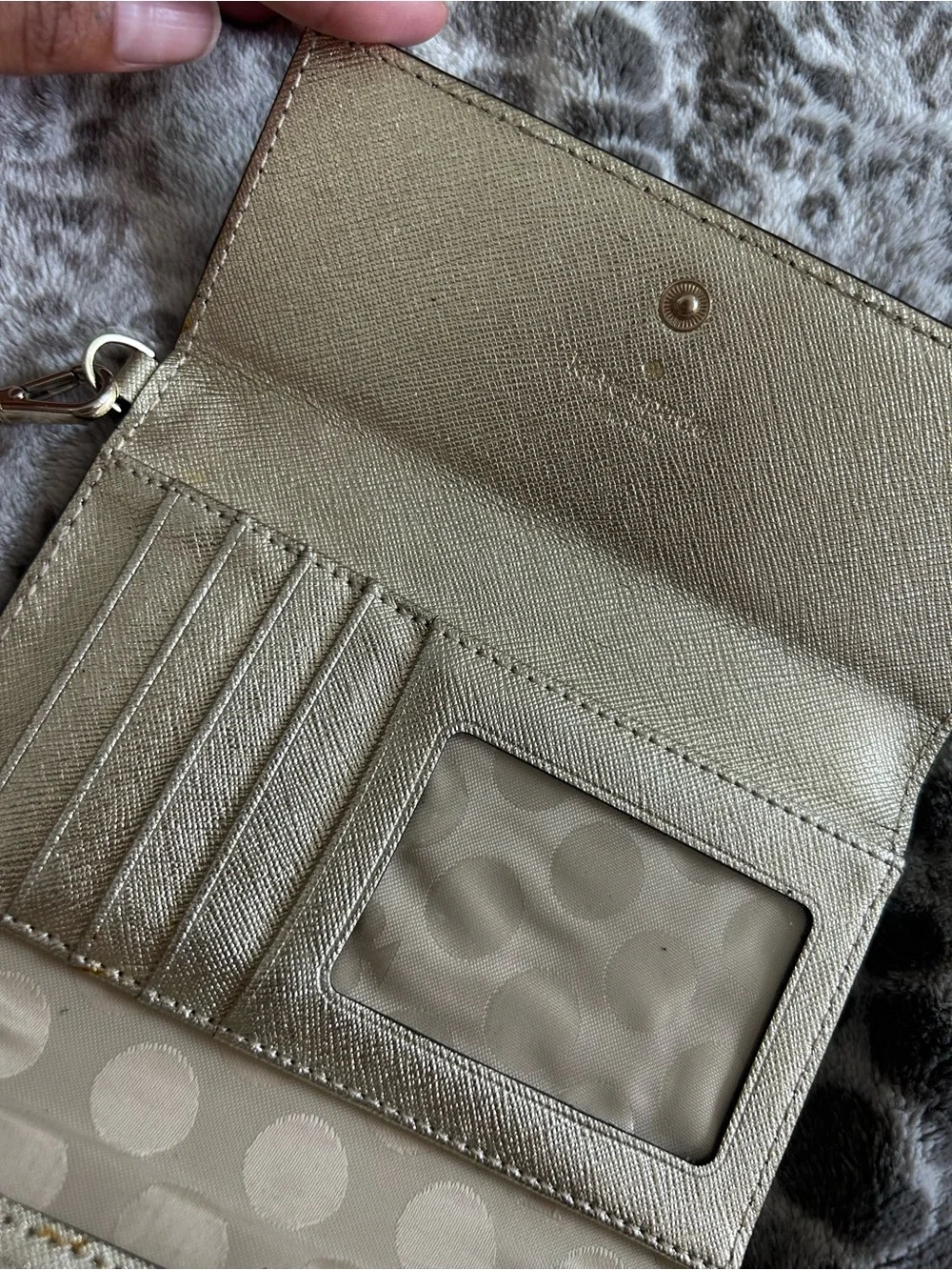 kate spade metallic gold wristlet clutch with black strap